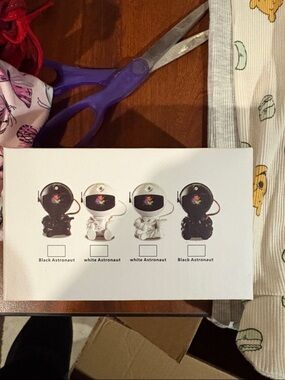 Astronaut Figurine Box — Black & White Astronauts projector